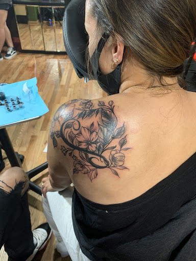 Find tattoo ideas friendship for your next unique tattoo in Lake Villa at Eternal Tiger Tattoo