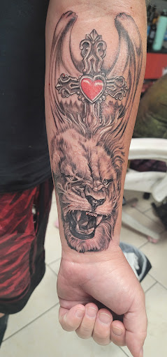 Explore monopoly tattoo ideas, creative tattoo ideas in Ocoee, available at Slaughterized Ink Tattoo and Piercing Studio