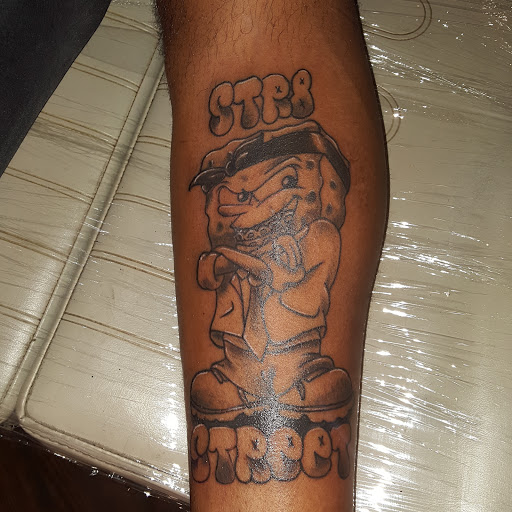 Explore female warrior tattoo ideas, creative tattoo ideas in Newport, available at Mutiny Tattoo Co. LLC