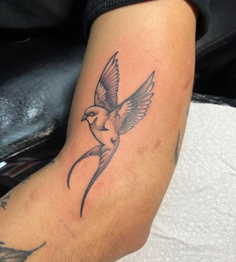 Explore indiana jones tattoo ideas, creative tattoo ideas in Lewes, available at Ancient Art Tattoo & Piercing Studio