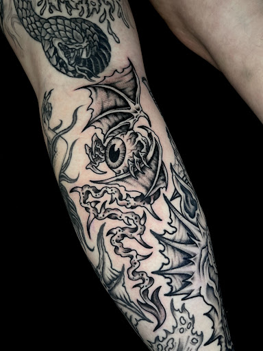 Explore neck tattoo ideas small, creative tattoo ideas in Johnson City, available at Gold Cross Tattoo Co.