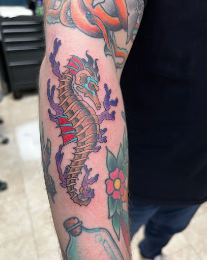 Explore mens tricep tattoo ideas, creative tattoo ideas in La Crosse, available at Blue Line Tattoo