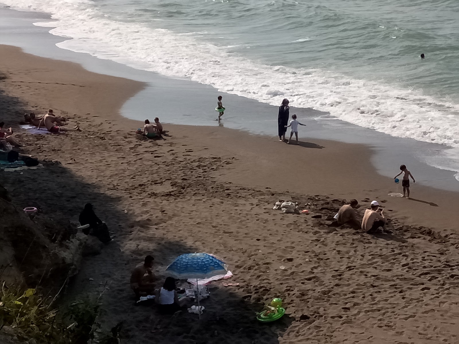 Pasalar plaji'in fotoğrafı - rahatlamayı sevenler arasında popüler bir yer