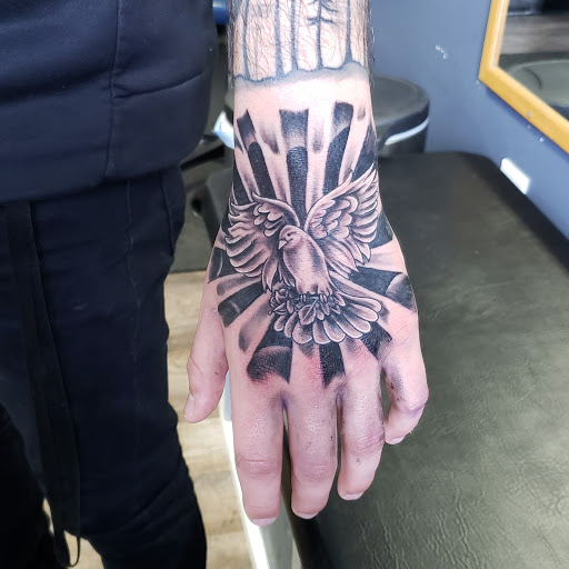 Tattoo Shop «Next Level Tattoo Company - Imlay City», reviews and photos, 420 E 3rd St, Imlay City, MI 48444, USA