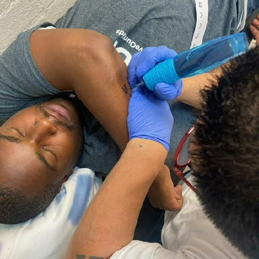 Explore lower back tattoo ideas for men, creative tattoo ideas in Mesa, available at Ranger Tattoo & Piercing