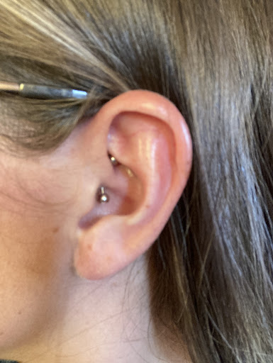 Explore dragon tattoo ideas for ladies, creative tattoo ideas in Cody, available at Dark Horse Body Piercing