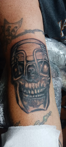 Explore skull tattoo ideas for guys, creative tattoo ideas in Green Bay, available at SPITFIRE CREATIONS