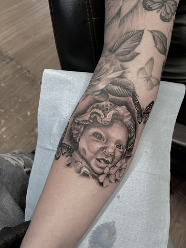Explore background tattoo ideas, creative tattoo ideas in Rochester, available at The Ink Cartel Tattoo