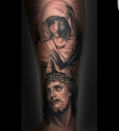 Explore colour tattoo sleeve ideas, creative tattoo ideas in Fort Wayne, available at Grade A Tattoos and Body Piercing