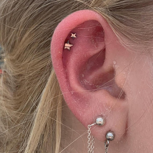 Explore moon tattoo ideas for females, creative tattoo ideas in Lewes, available at Ancient Art Tattoo & Piercing Studio