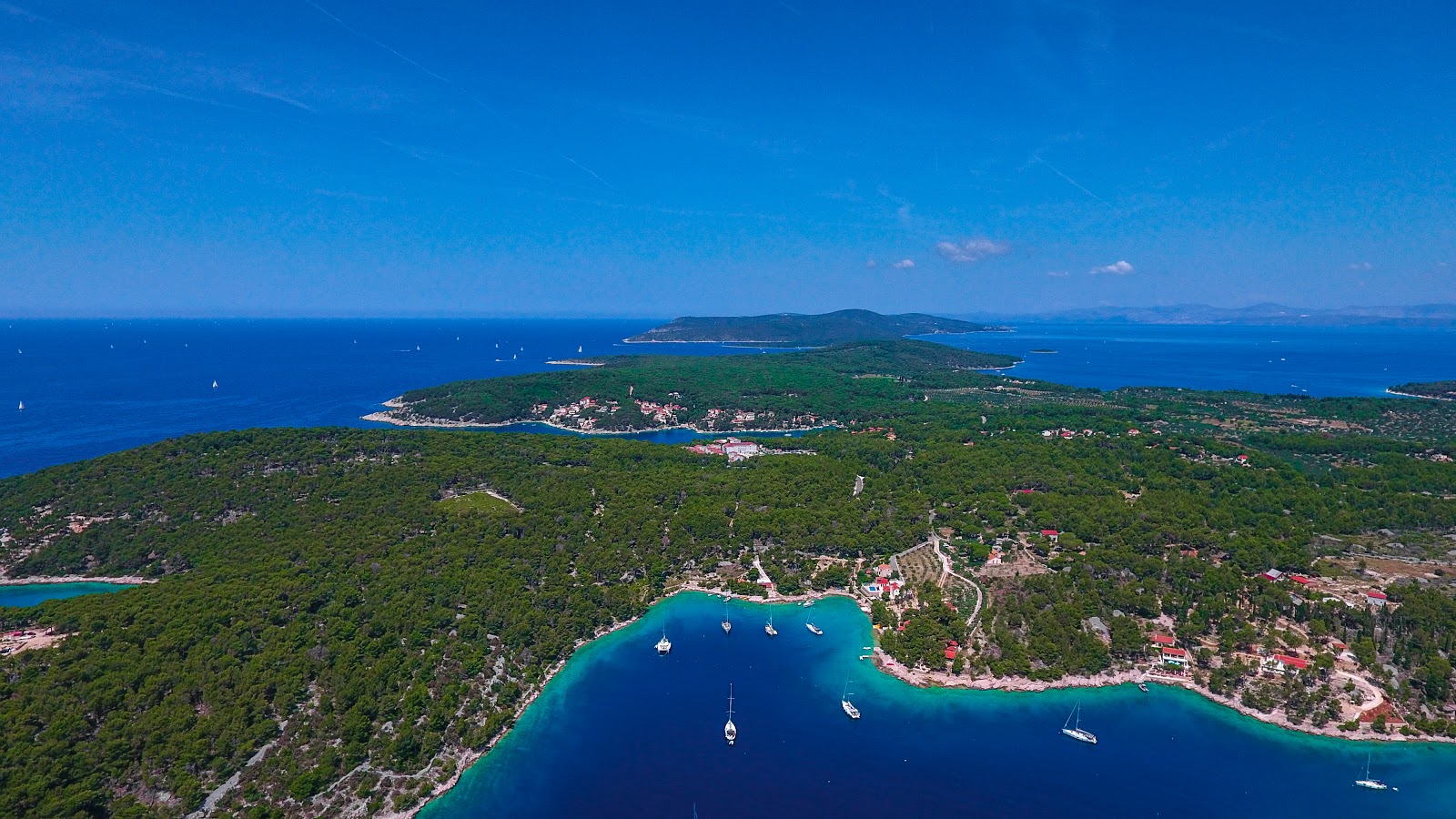 Foto de Port beach con terreno rocoso superficie