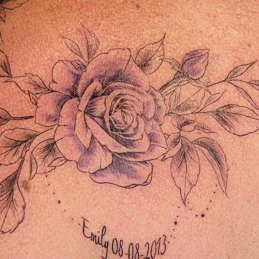 Explore fullback tattoo ideas, creative tattoo ideas in Sarasota, available at Z-Edge Tattoo and Body Piercing North Shop