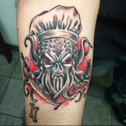 Explore ripped skin tattoo ideas, creative tattoo ideas in Grove City, available at Rebel Sails Tattoo