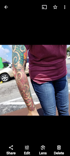 Explore wolf sleeve tattoo ideas, creative tattoo ideas in Englewood, available at The Original Big Daddy Tattoo & Body Piercing est.1997 est.1997