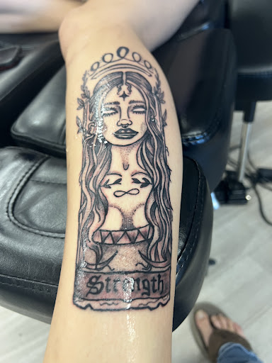 Explore lock tattoo ideas, creative tattoo ideas in Cocoa, available at Rorschach Tattoo Shop and Piercing Studio