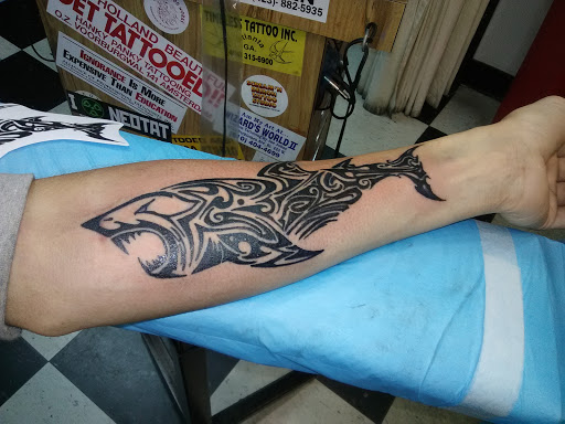 Explore women's arm tattoos ideas, creative tattoo ideas in Harriman, available at Tattoos By Bryan