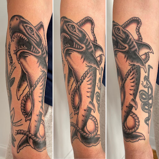Explore ankle heart tattoo ideas, creative tattoo ideas in Kansas City, available at Golden Stag Tattoo and Gallery