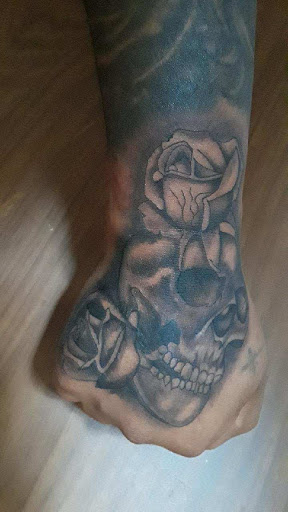 Explore pistol tattoo ideas, creative tattoo ideas in Espanola, available at Daydreamer Tattoo