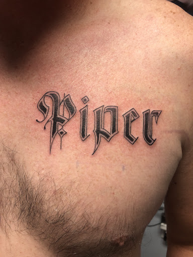 Explore calf tattoo ideas for men, creative tattoo ideas in Englewood, available at Point of Entry Tattoo