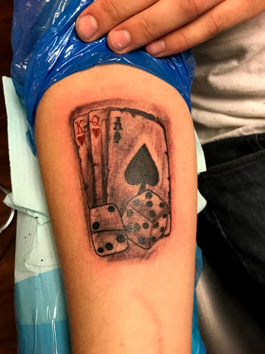 Explore tattoo ideas for men hand, creative tattoo ideas in Seymour, available at American Gypsy Tattoo Corp.