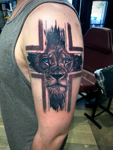 Explore ortiz tattoo ideas, creative tattoo ideas in Keene, available at Creative Ink Tattoo Studio