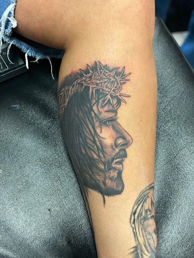 Explore simple hand tattoo ideas, creative tattoo ideas in Chillicothe, available at Grimey Inc Tattoos