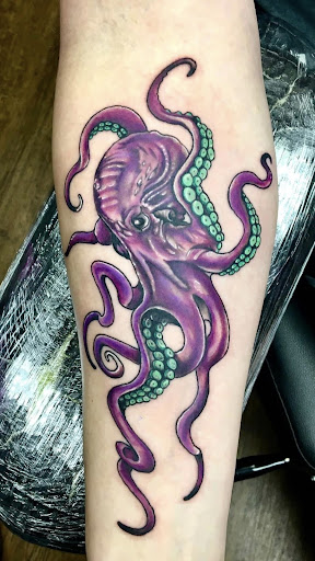 Explore small thigh tattoo ideas, creative tattoo ideas in Abilene, available at Sacred Art