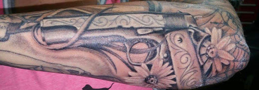 Explore 1993 tattoo ideas, creative tattoo ideas in Denison, available at Mad House Tattoos