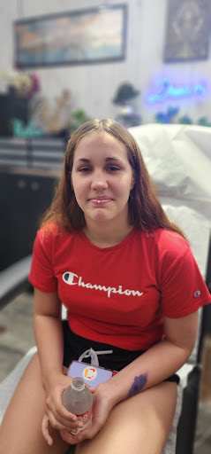 Explore aquarius tattoo ideas for men, creative tattoo ideas in Marysville, available at Hawaiian Touch Piercing Co.