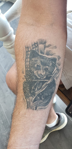 Explore small cover up tattoo ideas, creative tattoo ideas in Pigeon Forge, available at Black Orchid Tattoo Studio