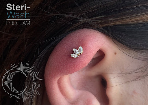 Explore stl tattoo ideas, creative tattoo ideas in Appleton, available at Celestial Piercing- Inside of Big Guns Tattoo