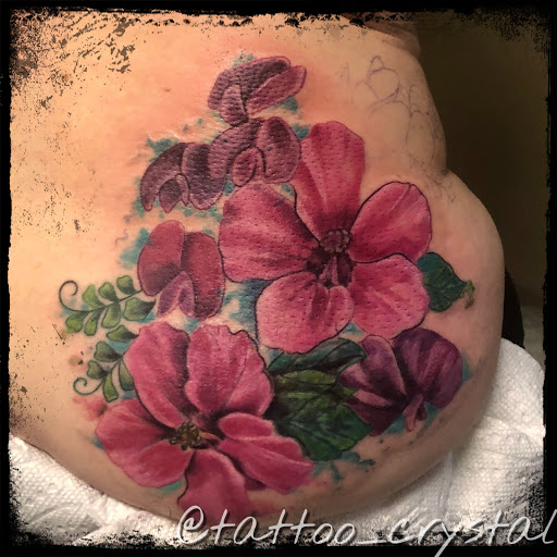 Explore gladiolus tattoo ideas, creative tattoo ideas in Lawrenceville, available at Magick Dragon Tattoo