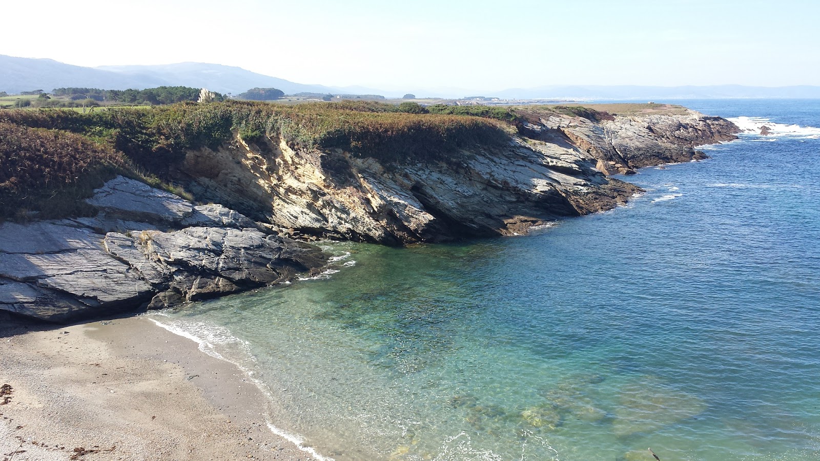 Photo de Praia de Gabieira avec l'eau cristalline de surface