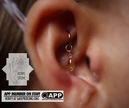 Explore red string tattoo ideas, creative tattoo ideas in Mobile, available at Royal Stone Piercing