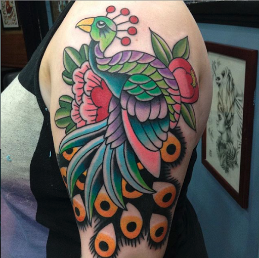 Explore small dragon tattoo ideas, creative tattoo ideas in Boston, available at Good Faith Tattoos