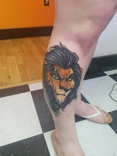 Explore kiss tattoo ideas, creative tattoo ideas in Nicholasville, available at Castle of Color