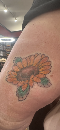 Explore male foot tattoo ideas, creative tattoo ideas in Loveland, available at Satori Tattoo