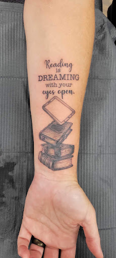 Explore trapezius tattoo ideas, creative tattoo ideas in Ocala, available at Black Lotus Tattoo & Art Gallery Inc