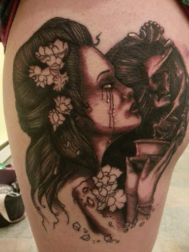 Explore boxing gloves tattoo ideas, creative tattoo ideas in Powell, available at Against All Odds Tattoos and Piercings