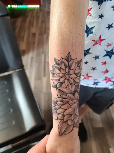 Explore 2222 tattoo ideas, creative tattoo ideas in Clarkston, available at Rogue Tattoo