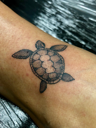 Explore feminine half sleeve tattoo ideas, creative tattoo ideas in San Diego, available at Ink Mindset Studios