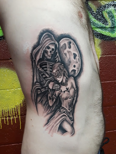 Explore top of the foot tattoo ideas, creative tattoo ideas in Abilene, available at A Tattoo Experience by Spaz