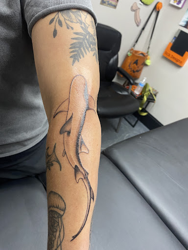 Explore small wave tattoo ideas, creative tattoo ideas in Myrtle Beach, available at Elite Ink Tattoos of Myrtle Beach