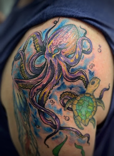 Explore mens butterfly tattoo ideas, creative tattoo ideas in North Fort Myers, available at Loyal 2 The Coil Tattoos & Body Piercings