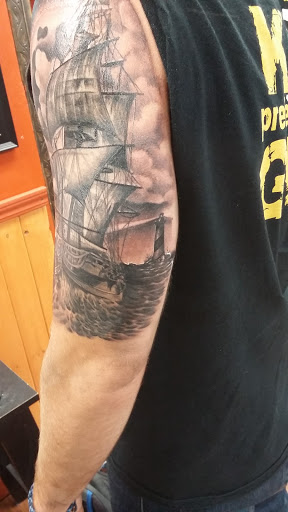 Explore dog paw tattoos ideas, creative tattoo ideas in Pikeville, available at Small Town Tattoo