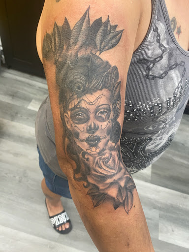 Explore name face tattoo ideas, creative tattoo ideas in Avon Park, available at Lions Den Ink Studio at The Collective