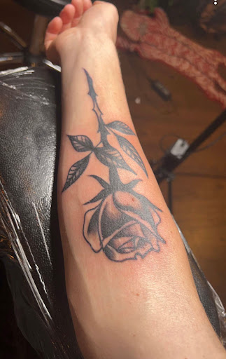 Explore hand tattoo ideas man, creative tattoo ideas in Johnson City, available at Gold Cross Tattoo Co.