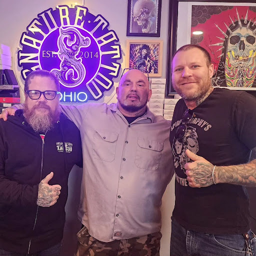 Explore bald head tattoo ideas, creative tattoo ideas in Northfield, available at Signature Tattoo and Supplies