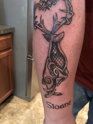Explore thigh tattoo ideas for men, creative tattoo ideas in Houston, available at Rose & Dagger Tattoo