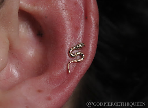 Explore fish tattoo ideas for females, creative tattoo ideas in West Palm Beach, available at Wooden Heart Tattoos and Piercings